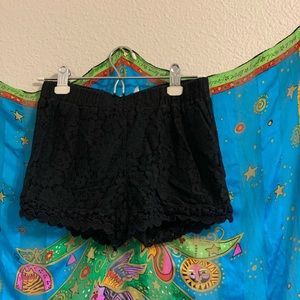 Black flower design shorts